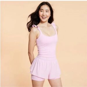 Blogilates Women's Ruffle Tank Top
Pink 1X